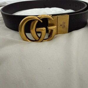 Gucci Black and Gold Belt